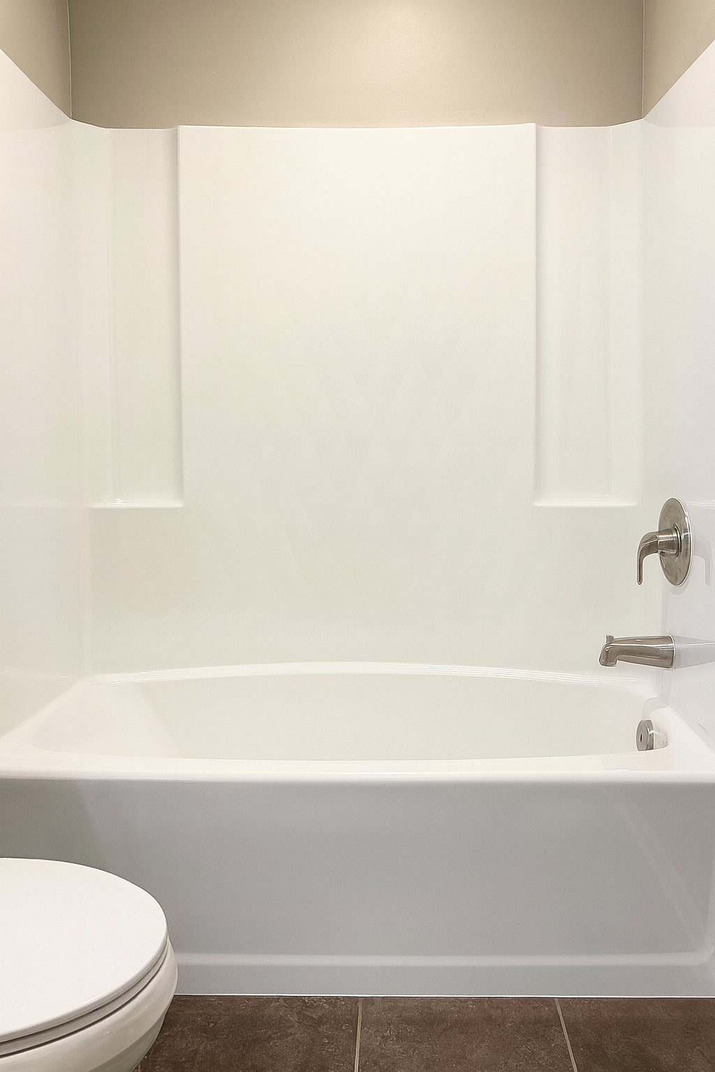 Newly refinished bathtub with smooth white reglazing in Bloomington MN